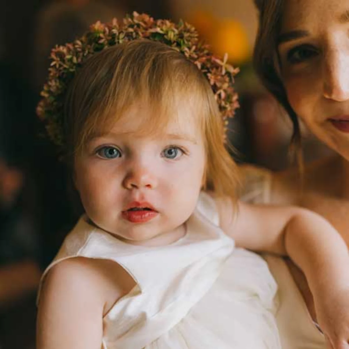 Flower girl looking at camera