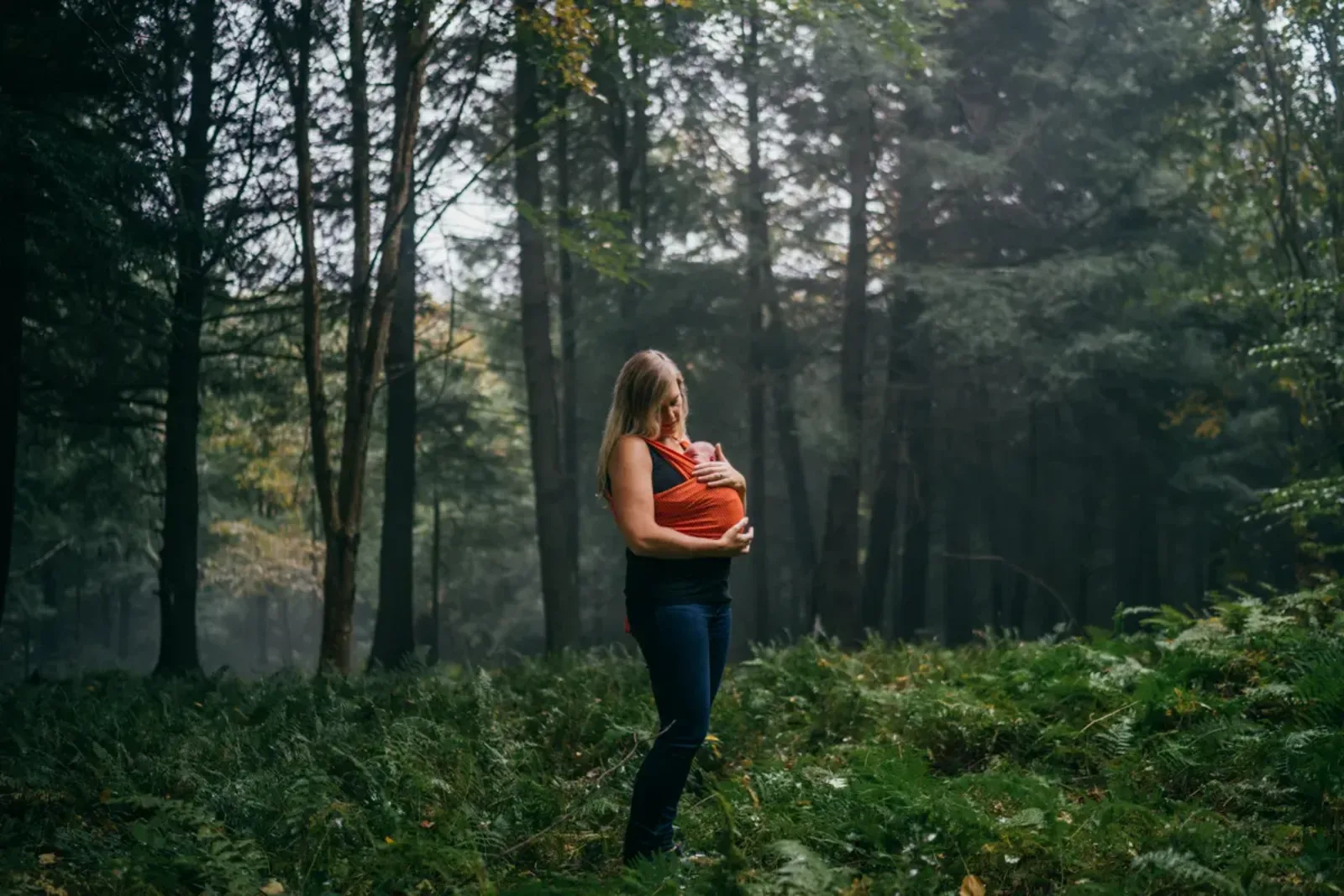 Family walking together in golden afternoon light during a Hudson Valley family photography session