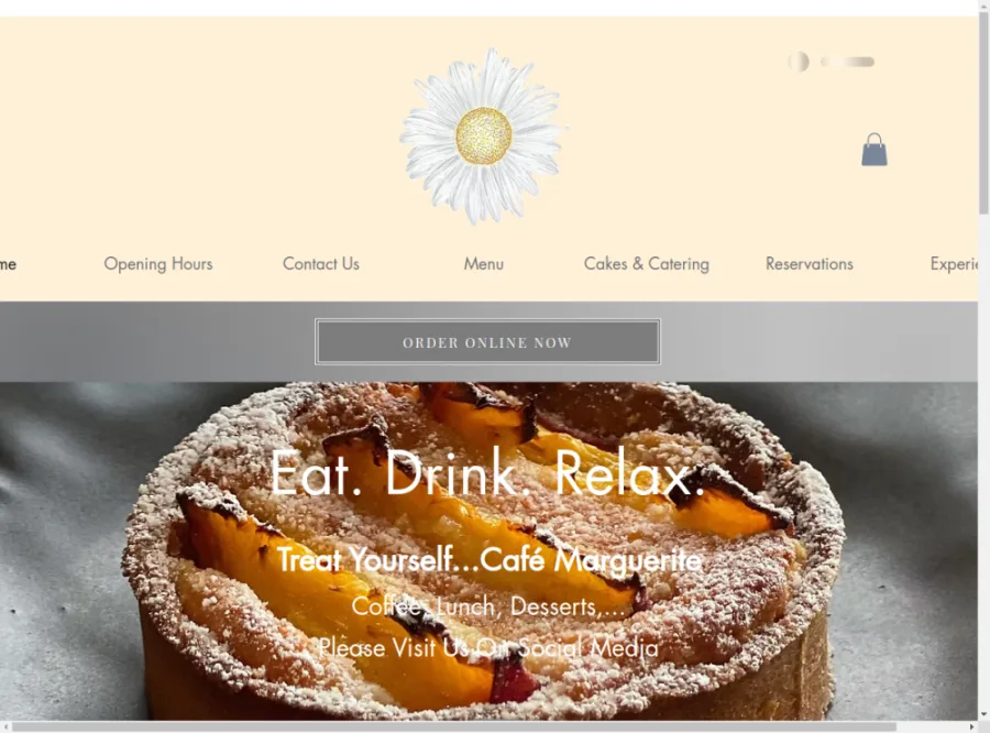 Full homepage screenshot of the Café Marguerite website