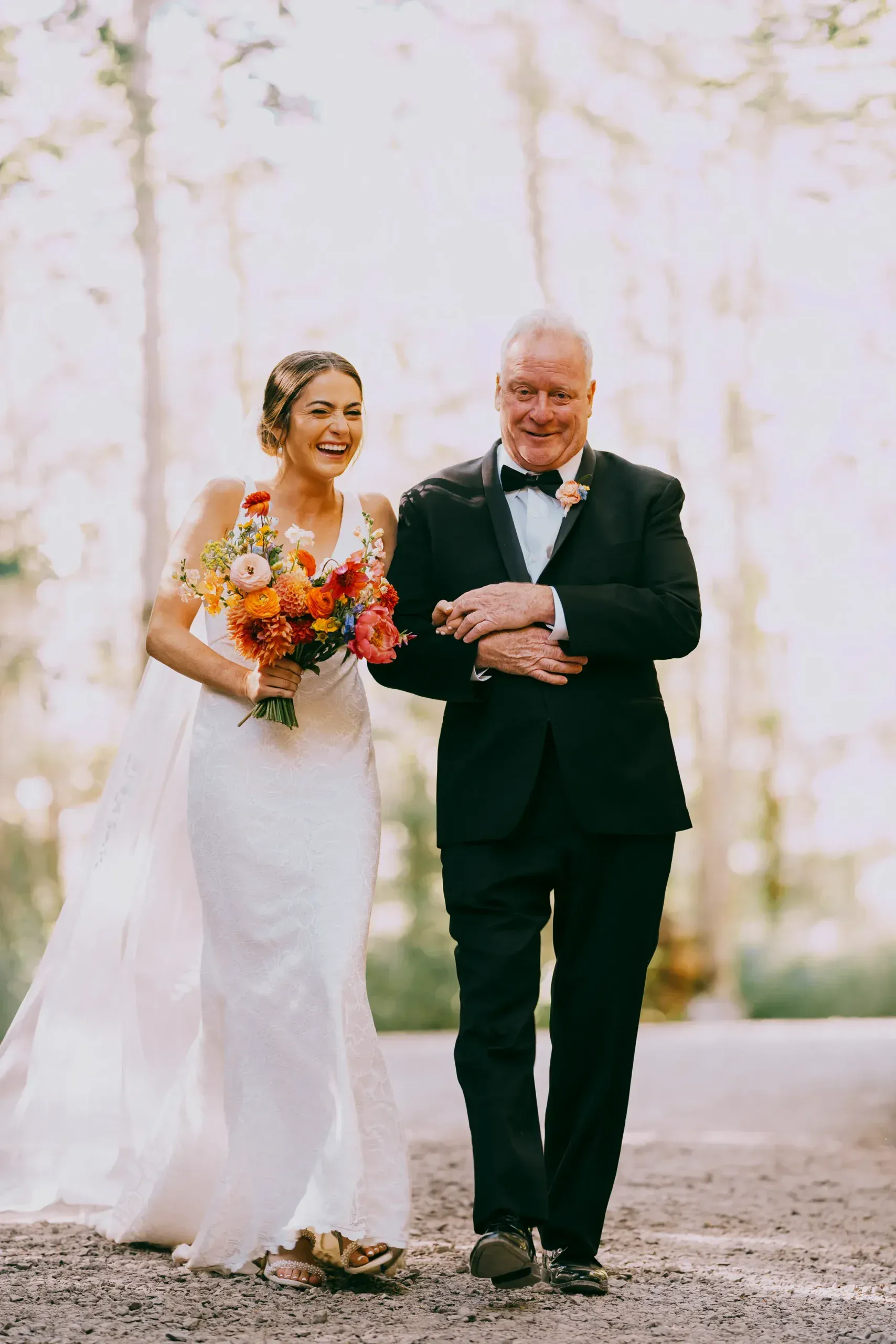 Father of bride walking daughter down the aisle